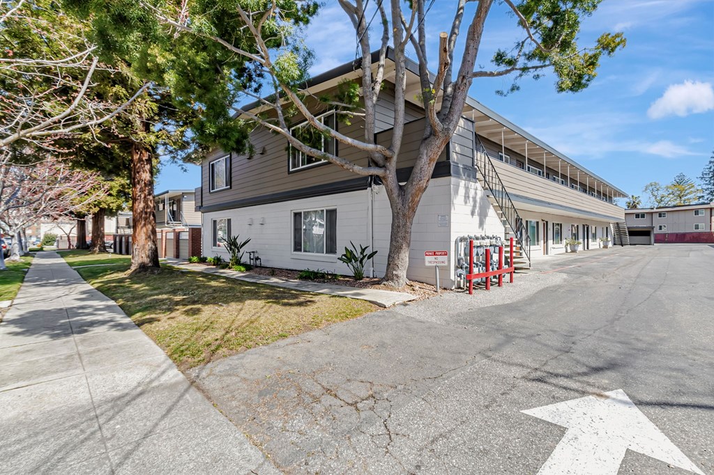 A white arrow painted on the pavement points to the right.