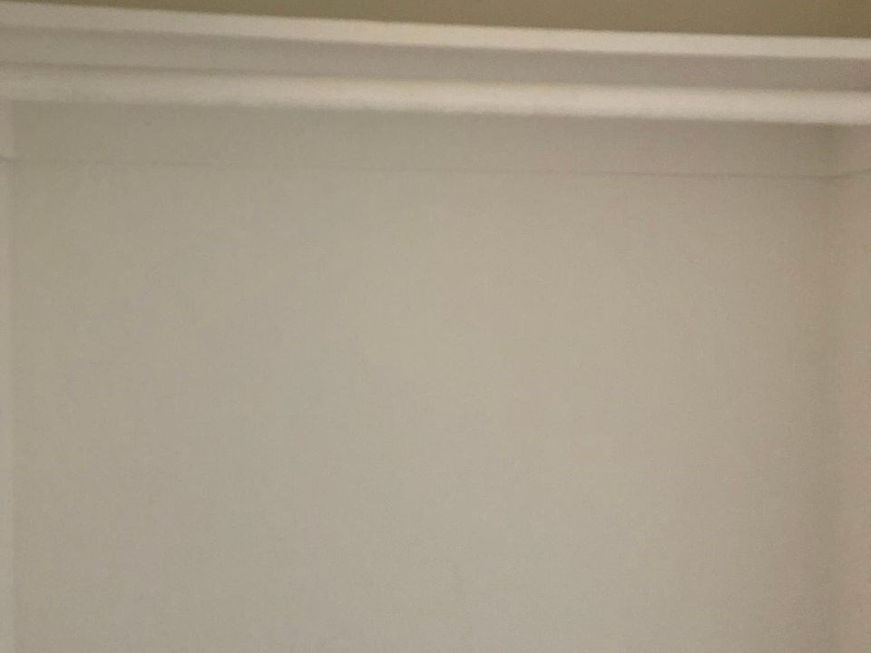 a white room with a white ceiling and white walls