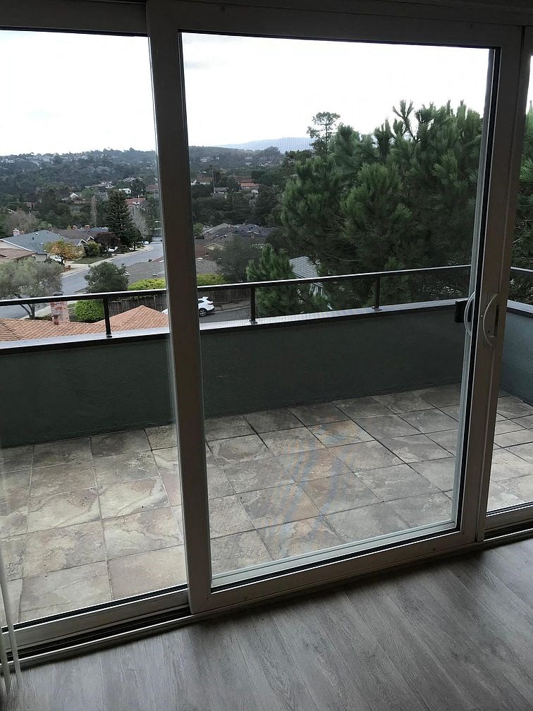 A view of a residential area from a balcony.