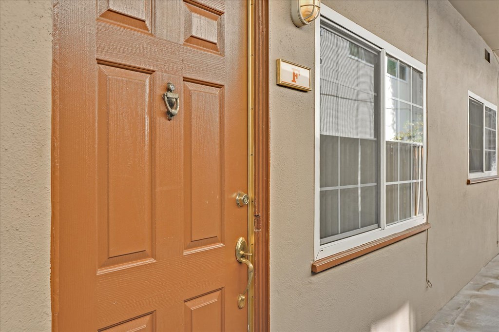 the front door of a house with a window
