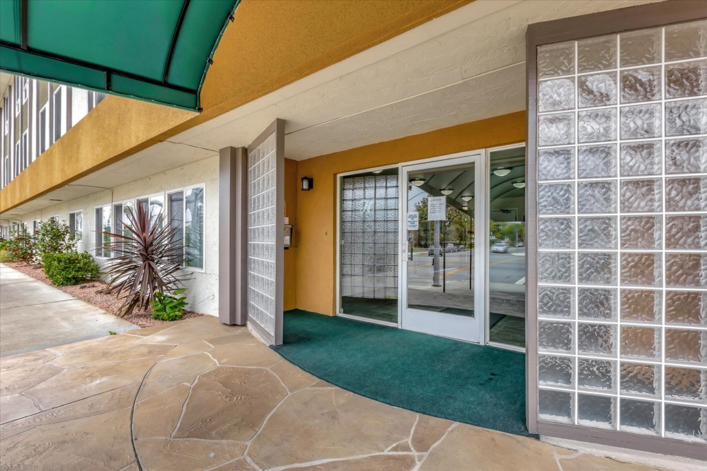 Front controlled access entrance doors