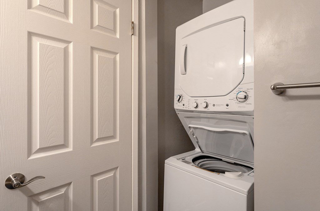 the washer and dryer in the laundry room of a home