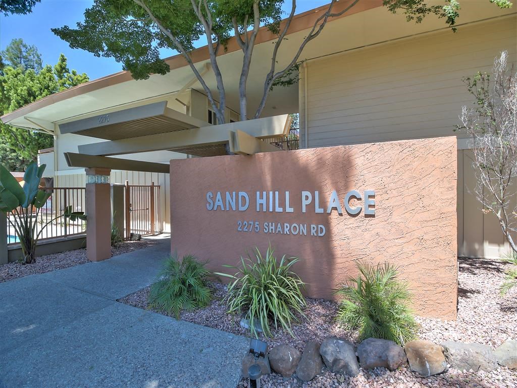 a sign place in front of a building