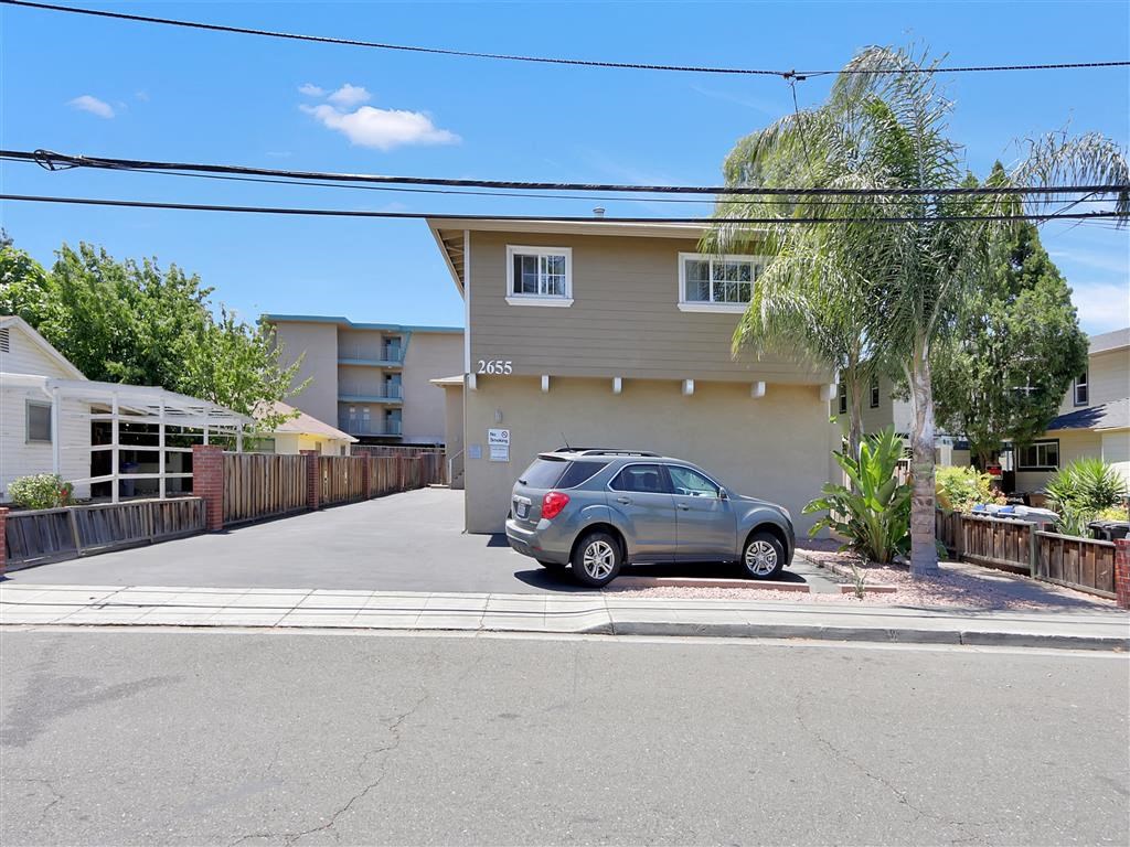 a car parked in front of a house