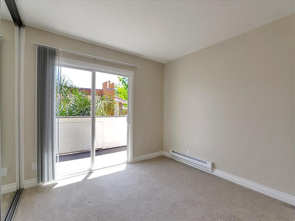 Living Room With Balcony at Casa Alberta Apartments, Sunnyvale, California