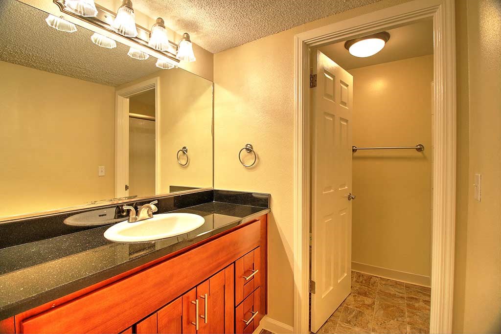 Bathroom With Adequate Storage at Sharon Grove Apartments, Menlo Park, California