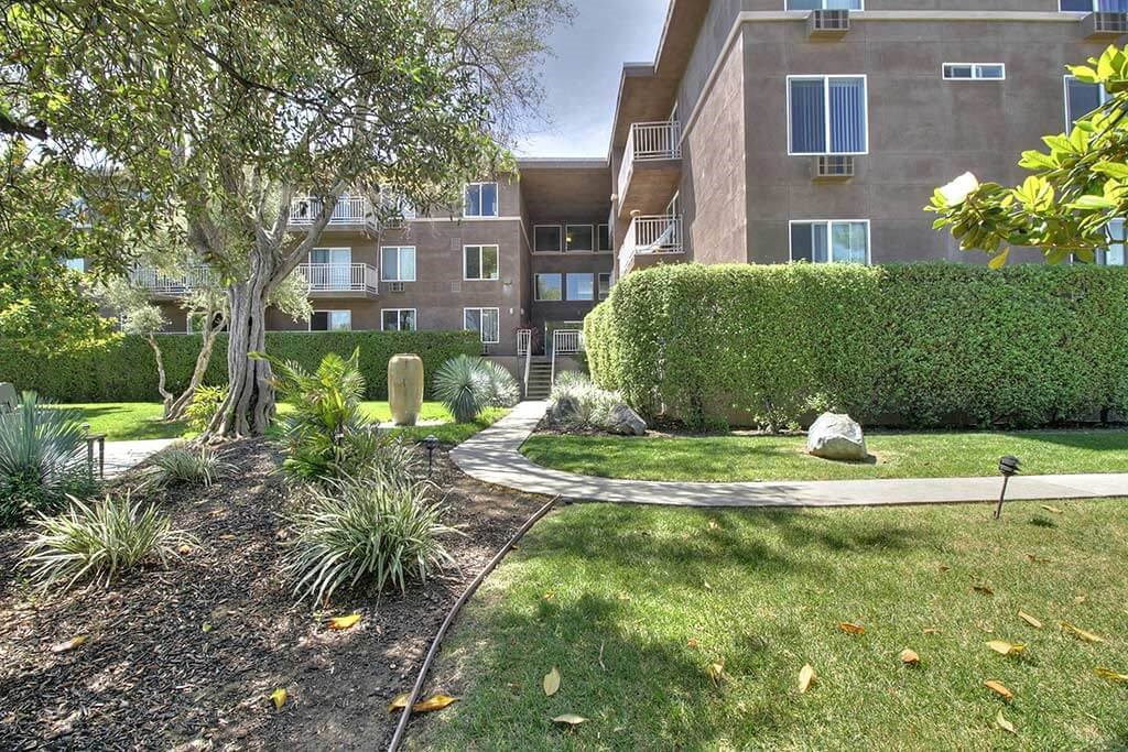 Plants, trees and hedges around the building at The Luxe, California, 95051