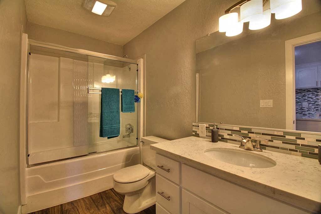 BAthoom with yellow lights at The Luxe, Santa Clara, 95051