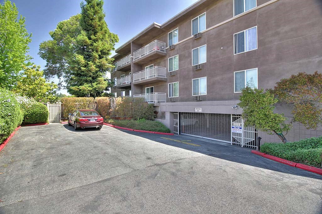 red car parked outside at The Luxe, Santa Clara