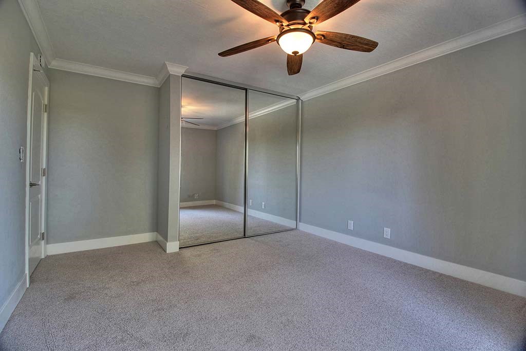 Interior design with ceiling fan and light at The Luxe, California
