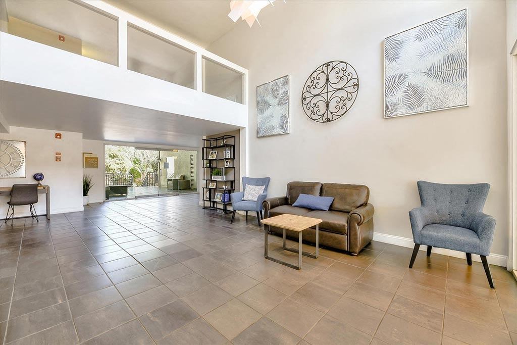 Lobby with wall frames at The Luxe, Santa Clara, California