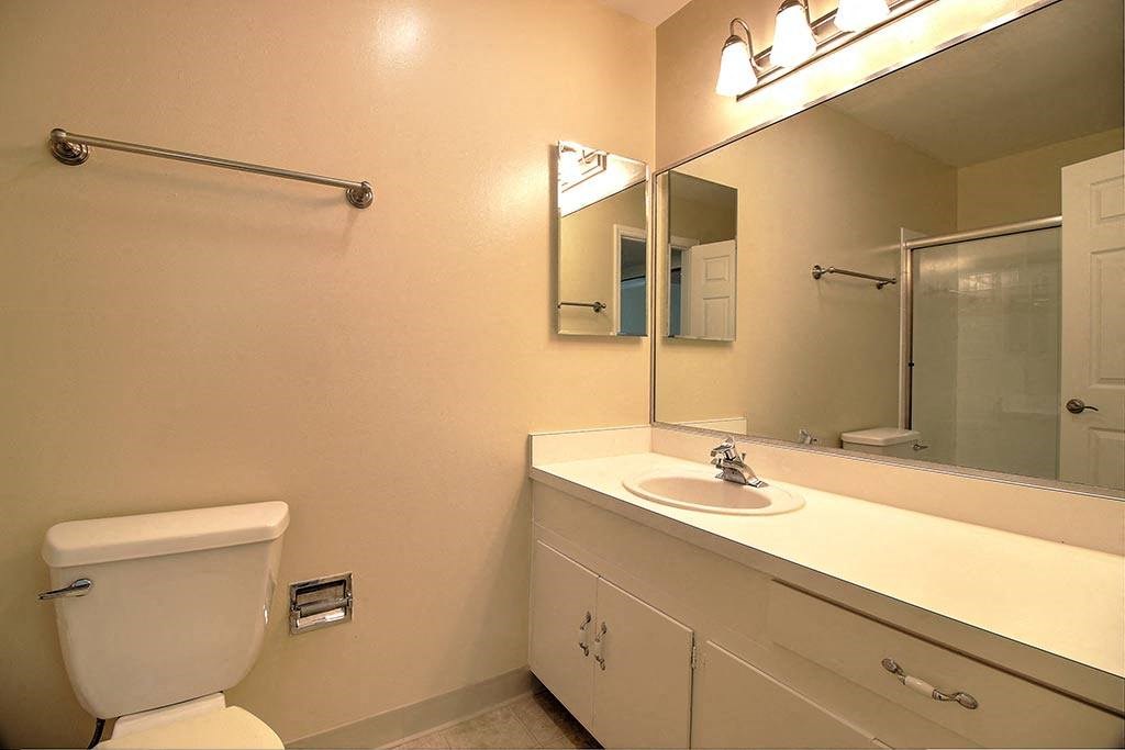 Bathroom with yellow lights at Wellesley Crescent, Redwood City, California