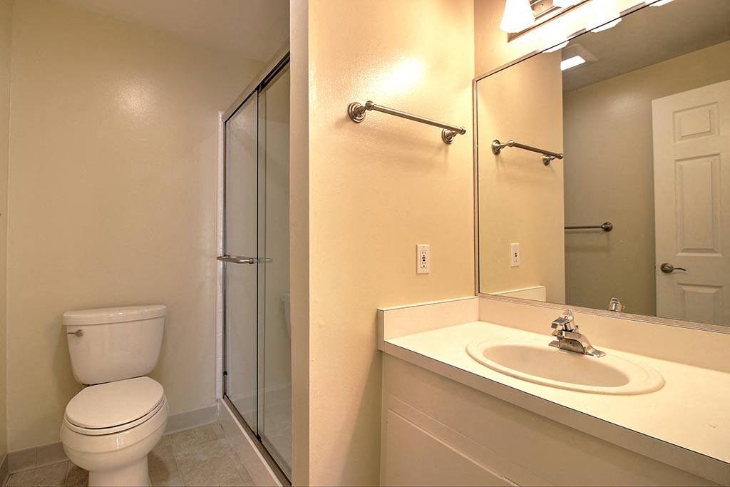 Bathroom with white interiors at Wellesley Crescent, Redwood City, CA