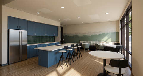 A modern kitchen with blue cabinets and a large island.