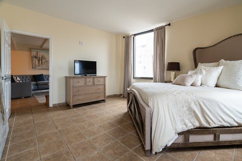 Primary Bedroom at 200 Carondelet Apartments, Louisiana