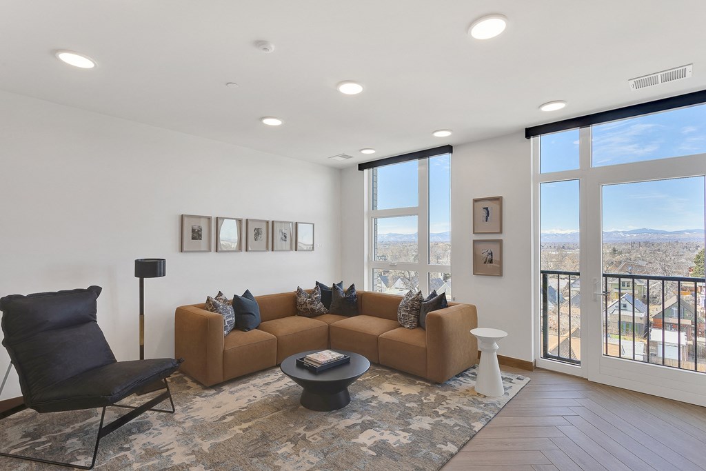 a living room with a couch and a chair