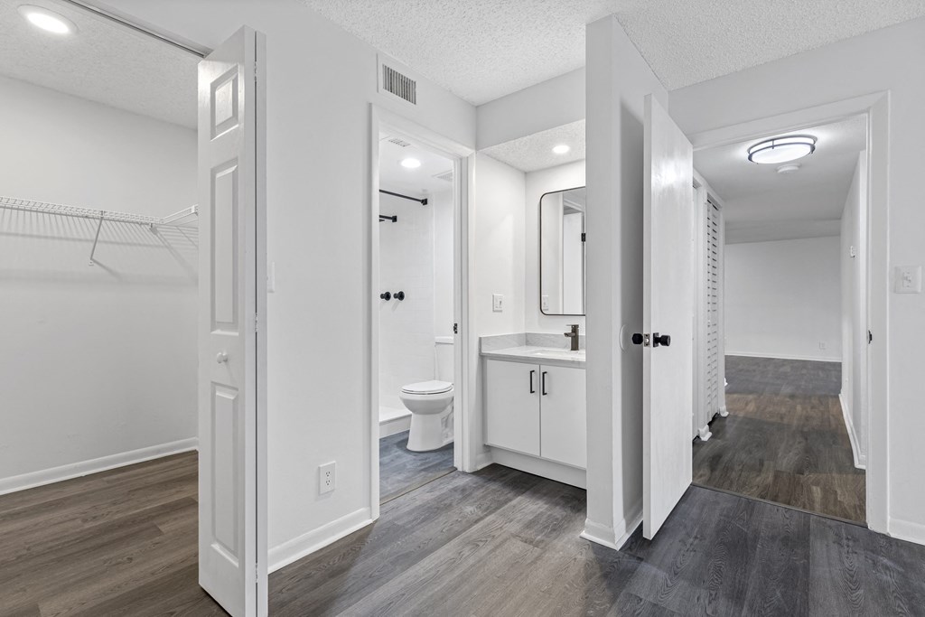 a bathroom with a toilet and a sink