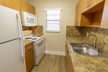 Vue on 67th Model Kitchen with White Appliances - Photo Gallery 29
