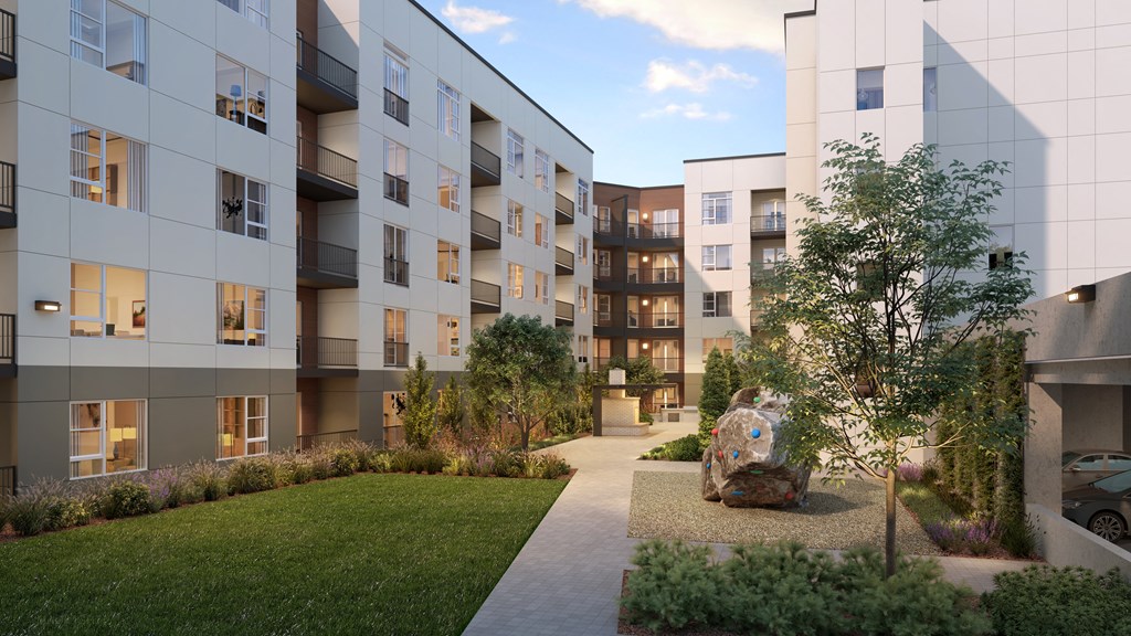 an artist impression of a courtyard between two apartment buildings