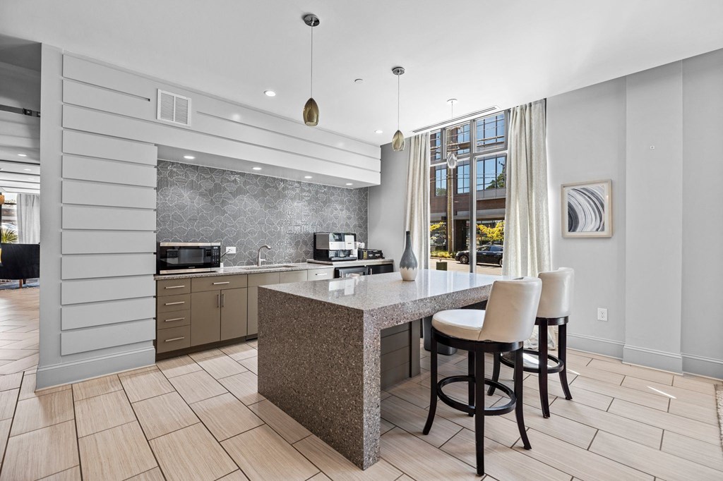 a kitchen with a counter top and a sink