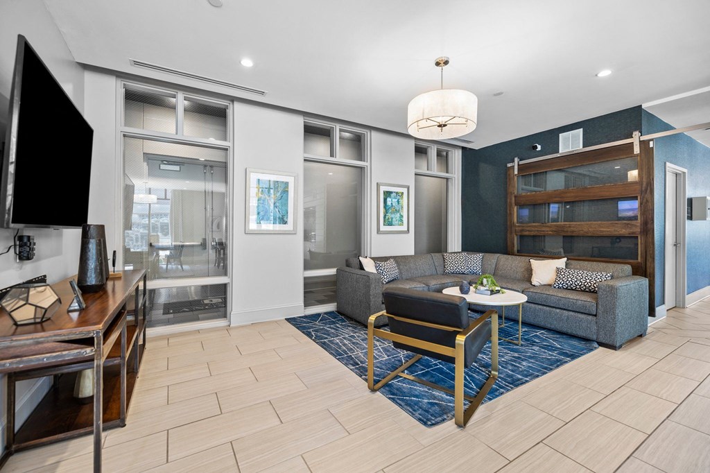 a living room with a couch and a table