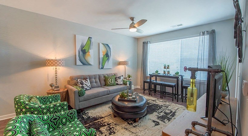 a living room with a couch and a table