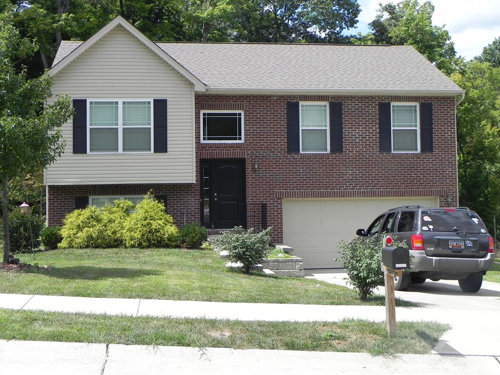 a car parked in front of a house