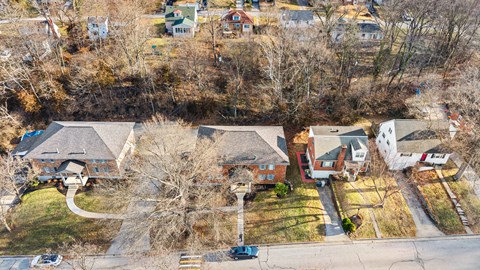 A residential area with houses and trees.