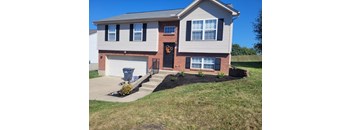 a house with a front yard that has been landscaped