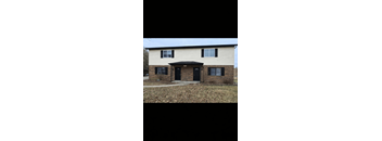 A house with a black door and windows.