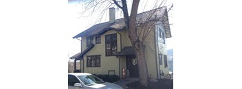 A house with a tree in front of it.at Maplehurst Apartments, Tennessee