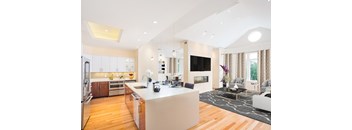 A modern kitchen with a large island in the middle.