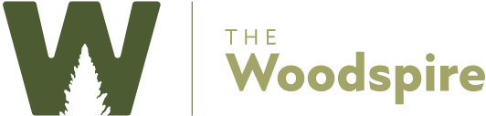 A handprint is next to the title of a book called "The Woodspire Woods".