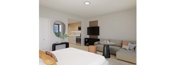 A modern living room with a white bed and a grey couch.