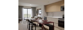 A modern kitchen with a dining table set for two.