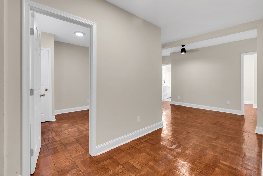 the living room and dining room are empty and ready to move into a new home