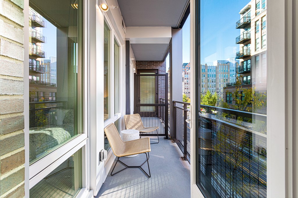 a balcony with a view of the city