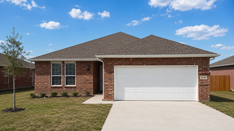 A house with a brown roof and a white garage door.