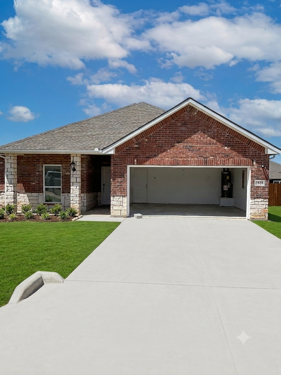 A house with a garage and a driveway.