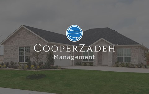 A house with the words "CooperZadeh Management" on the front.