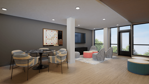 A modern dining room with a round table and chairs.