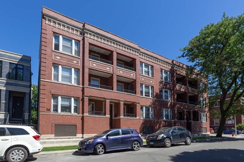 A red brick building with the words "BROOKLYN COLLEGE" on the top.