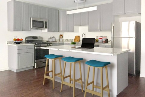 A kitchen with a white counter and blue stools.