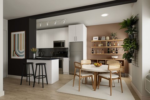 A modern kitchen with a dining table set for four.