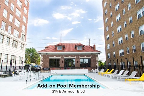 A pool surrounded by lounge chairs with a sign that says Add-on Pool Membership.
