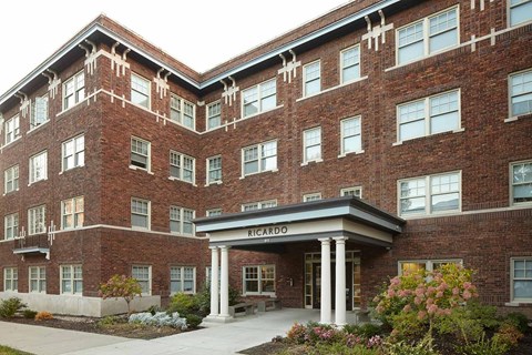 A large brick building with a sign that says Ricardo.