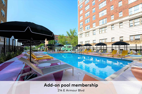 A pool with sun loungers and umbrellas is advertising add-on pool membership.