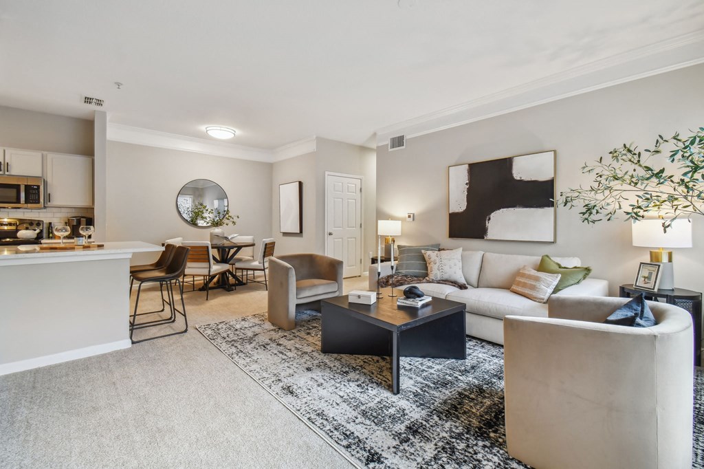 a living room with a couch and a table