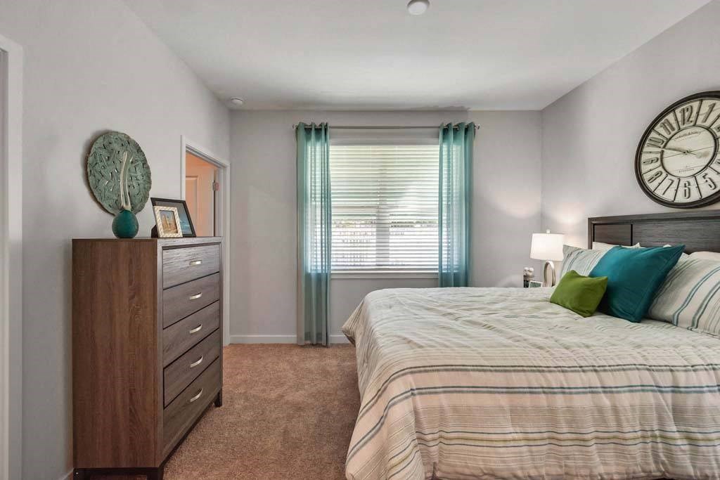 Bedroom With Expansive Windows at Waterline Bonita Springs, Bonita Springs, Florida