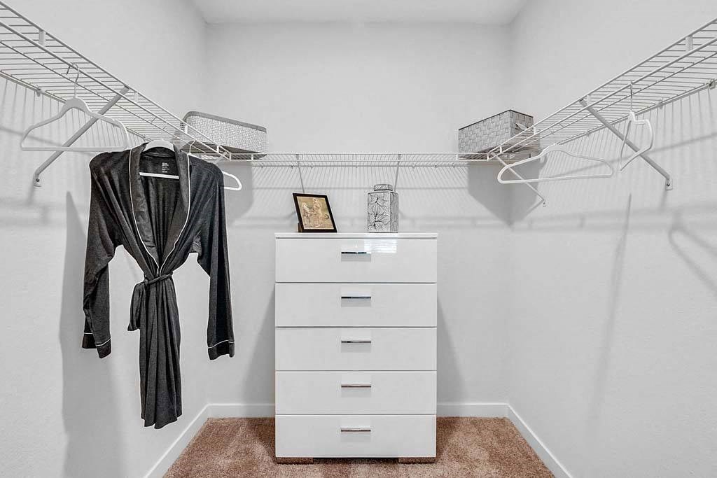 Generous Walk-In Closets With Shelving at Waterline Bonita Springs, Bonita Springs, FL, 34135